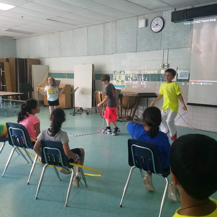 Jump rope in cafeteria with Rocky song