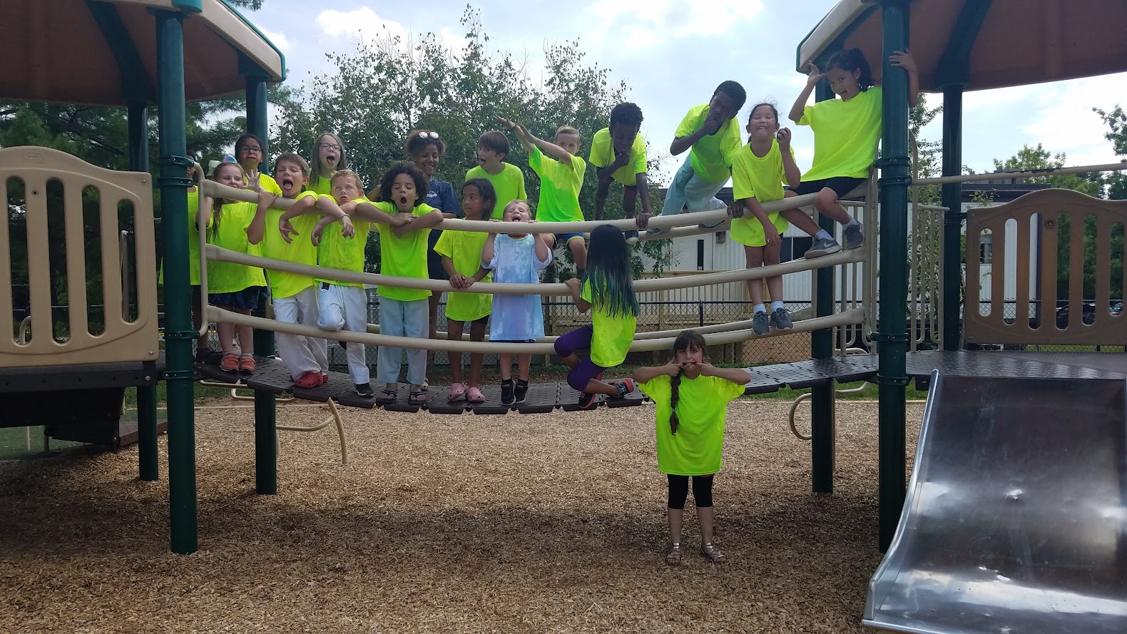 Kids making faces on playground