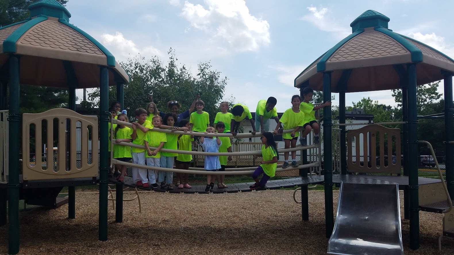 Wide shot group on playground