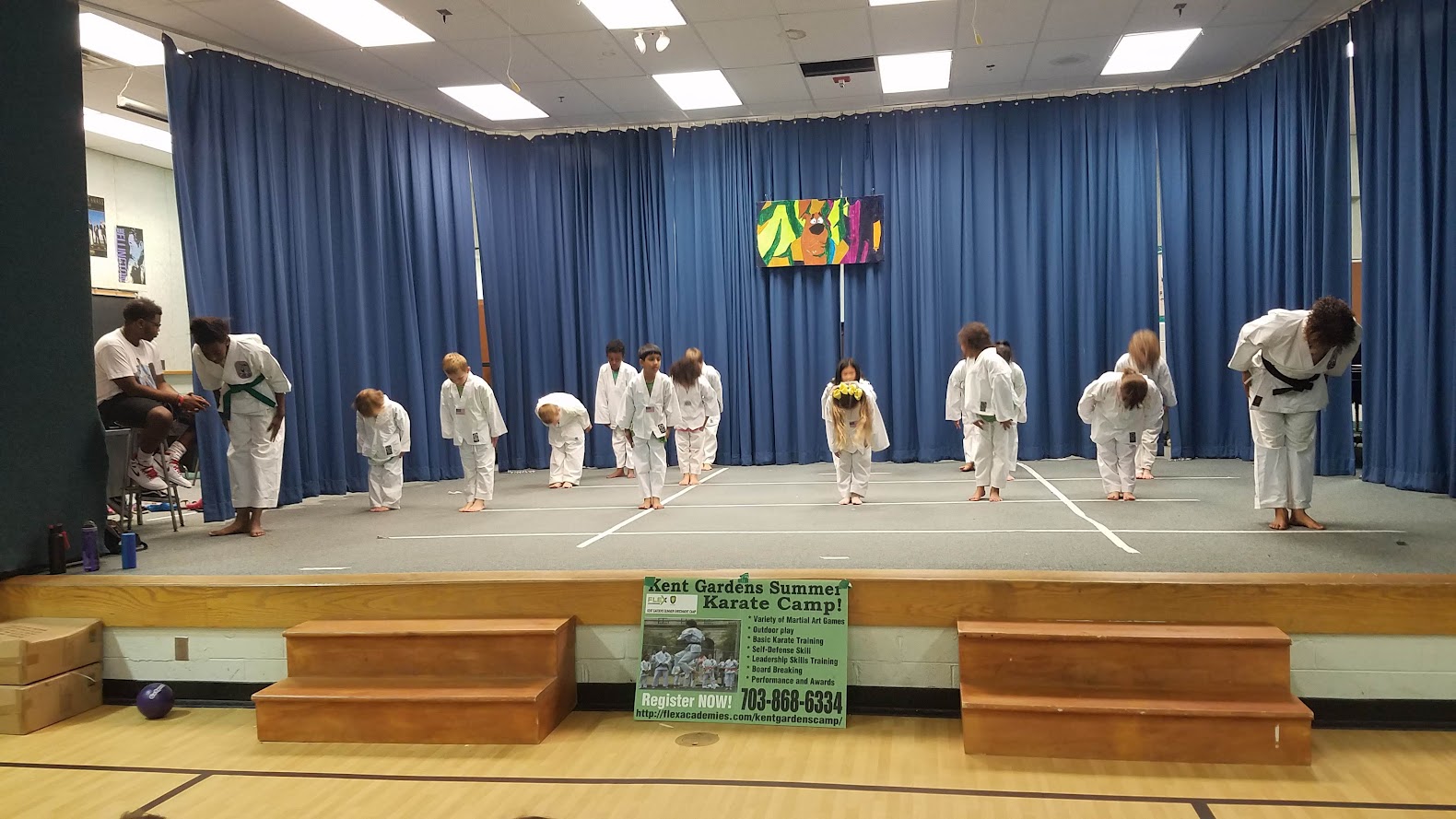 Karate performance on stage bowing